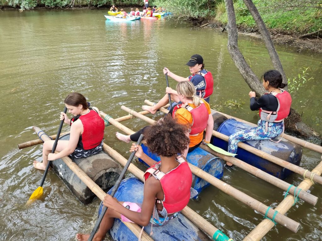 Teens camp river rafting